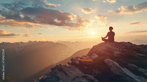 Person meditating at sunrise peak mountain © thesweetsheep