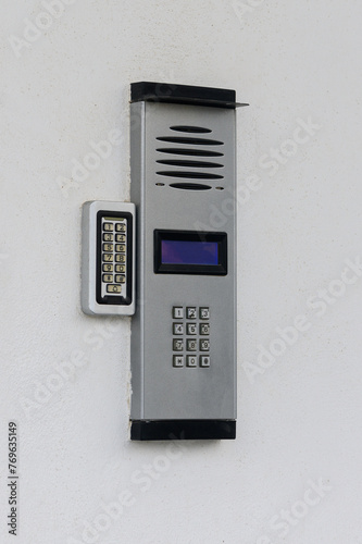 Intercom with camera on the wall of the house © Михаил Шорохов