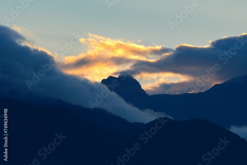 Sunset and clouds above Volcan Baru National Park, Panama photo