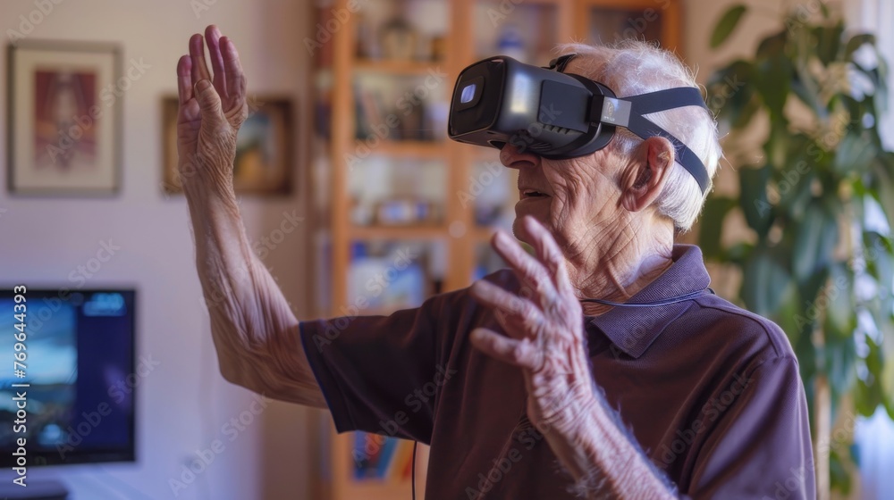 Fototapeta premium Elderly male engages with virtual reality technology, expressing wonder and curiosity in a cozy home setting.
