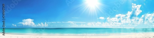 panoramic view beautiful beach with white sand turquoise ocean water and blue sky with clouds in sunny day natural background for summer vacation photo