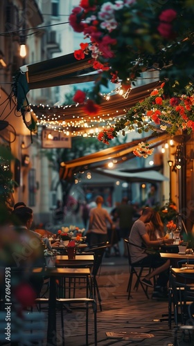 Street veranda of a cafe decorated with flowers on a city street, evening time, lights are on and people are sitting at tables. City life. Generated ai