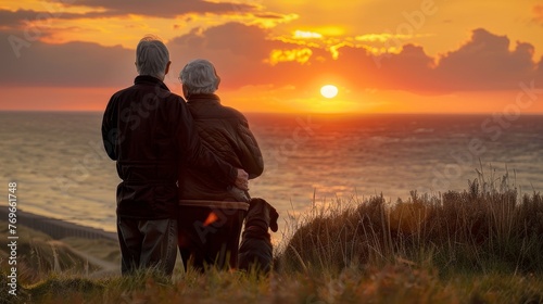 Backside view of an elderly couple with their dog, watching the sunset, highlighting a life enriched with companionship