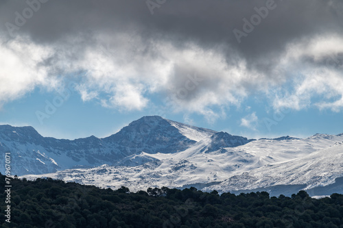 View of the snowy Mulhacen in Sierra Nevada (Granada, Spain); It is the highest peak in the Iberian Peninsula