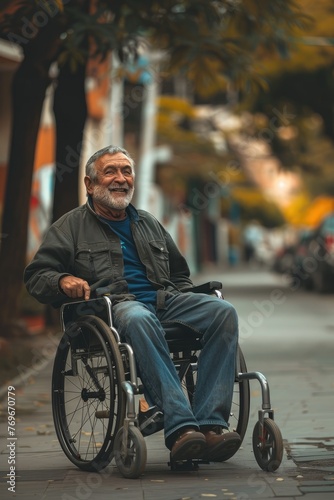 an inspirational and motivational disabled happy man sitting on a wheelchair on the street road © DailyLifeImages
