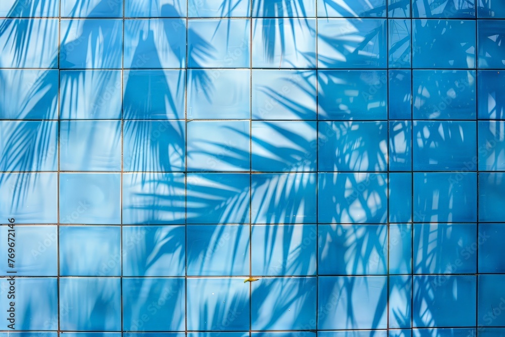 A serene scene of a vibrant blue tiled wall contrasted with lush palm leaves, creating a tropical oasis ambiance