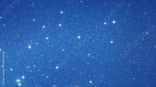 Blue Christmas background with snowflakes and stars. Copy space.