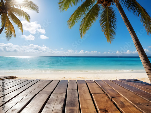 Summer panoramic landscape, nature of tropical beach with wooden platform, sunlight. Golden sand beach, palm trees, sea water against blue sky with white clouds