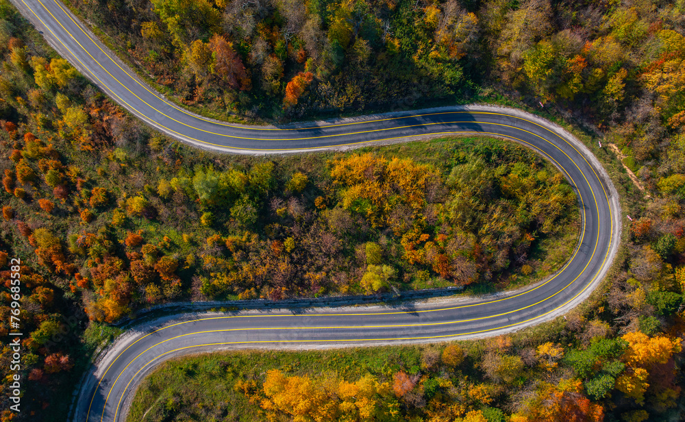 aerial view of inegol domanic road with beautiful autumn colors of nature, Kutahya, Turkey