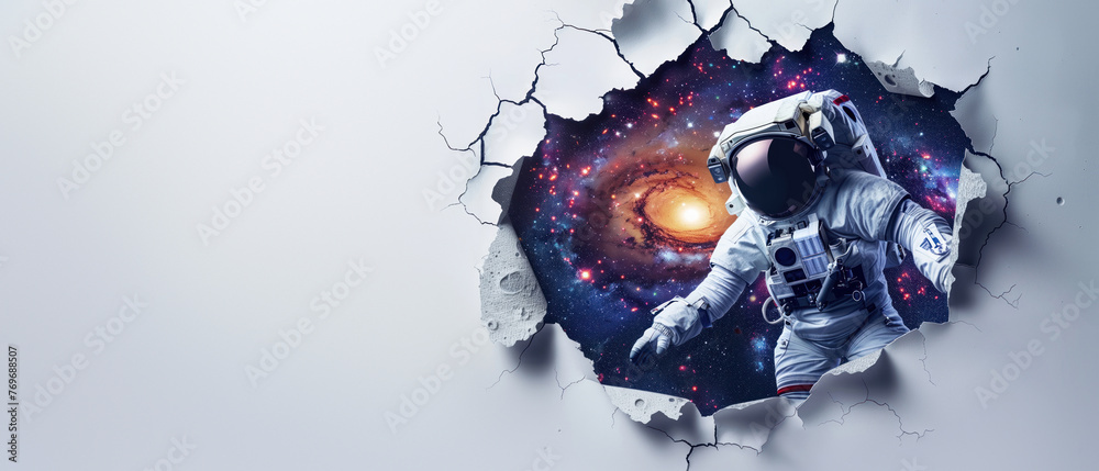 An astronaut seems to be entering into a galactic universe scene through a torn white wall, representing adventure - obrazy, fototapety, plakaty 