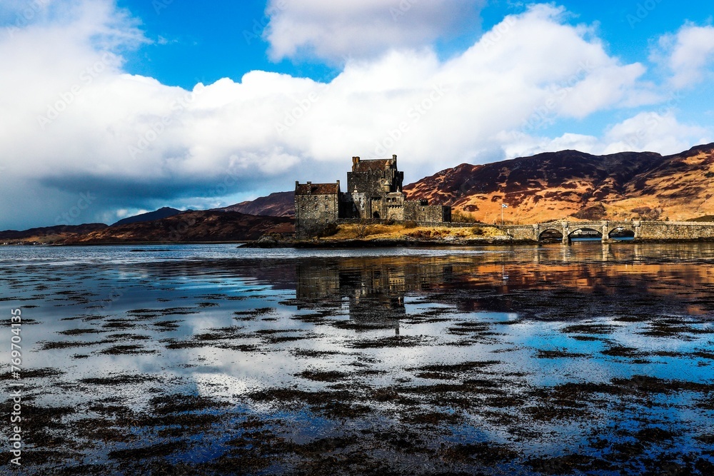 Scenic view of the medieval Eilean Donan castle in Scotland, UK