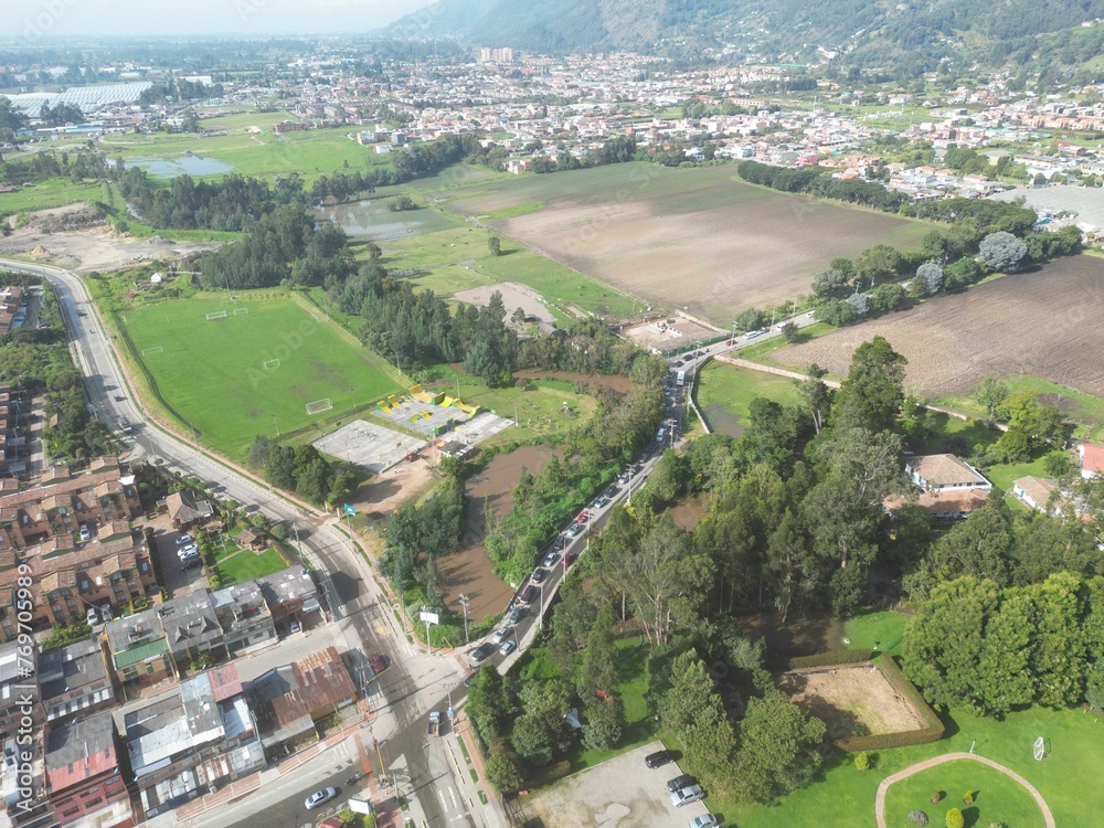 Aerial view of a residential area surrounded by lush greenery. Chia, Cundinamarca, Colombia.