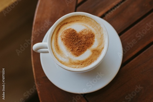 a cup of cappuccino with a heart on top