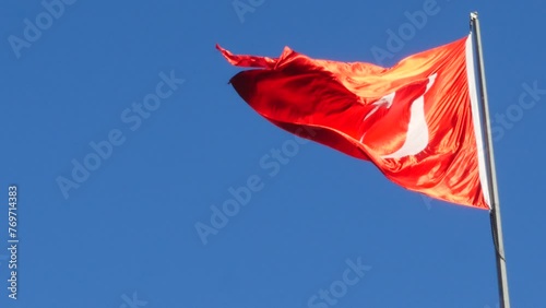Turkish flag in blue sky flap wind photo