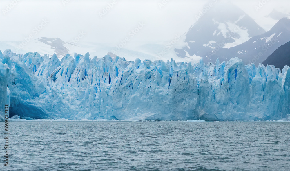 Majestic Blue Ice Glacier Front Rising from the Sea