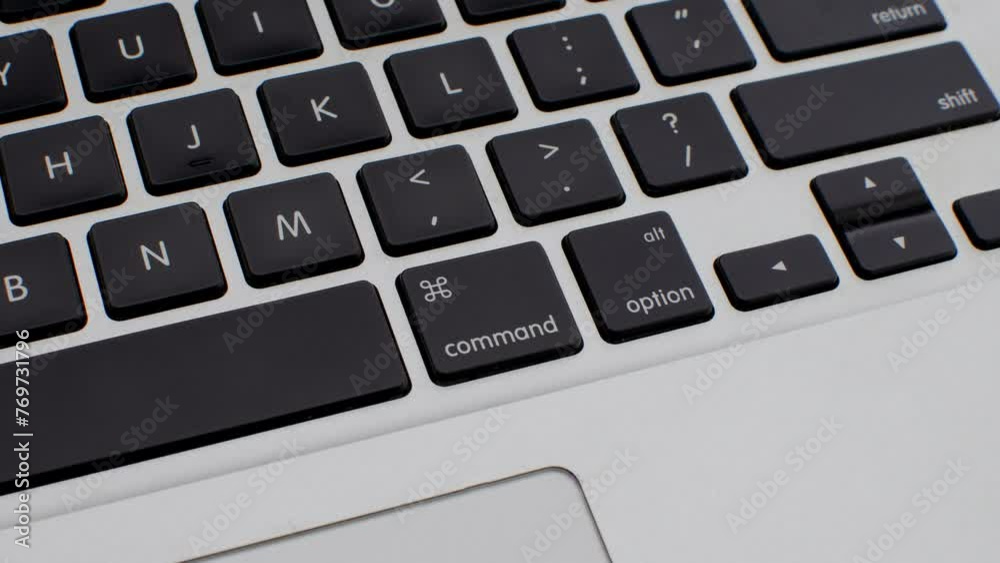 Close-up of laptop keys, symbolizing productivity and technology in contemporary work environments. Close-up of laptop keys, symbolizing productivity and technology in contemporary work environments.