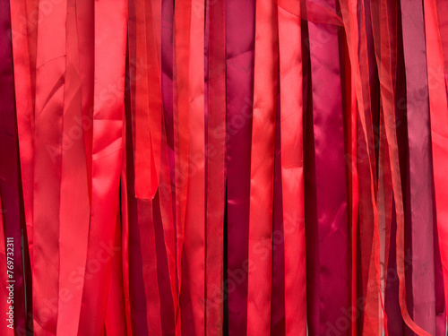 texture red ribbons hanging vertically