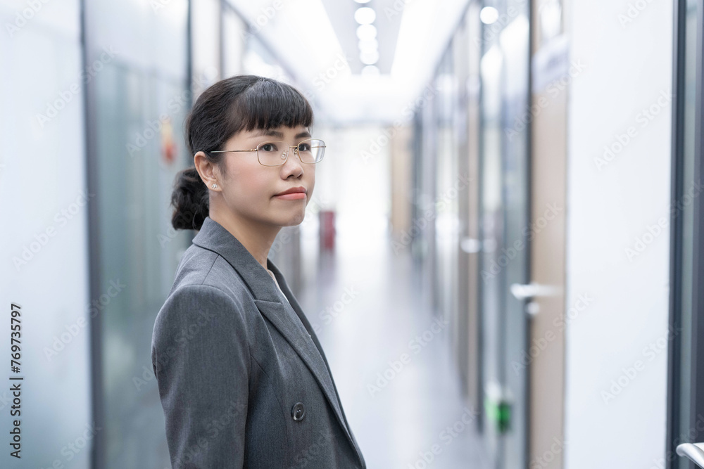 Image of business professional woman in office Image of business professional woman in office