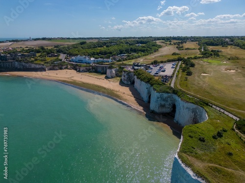 Aerial view of Broadstairs with its sandy beach and lush greenery around town. England, UK.