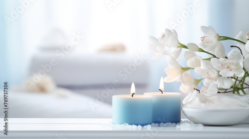 cosmetic background, aromatic candles, blue flowers in a vase on the background of the bathroom, concept of aroma and spa treatment at home