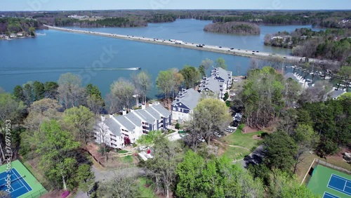 Motor boat heads in to port on Lake Norman in Davidson, NC photo