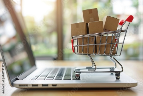 Imagine a symbolic online shopping concept where a cart filled with boxes is perched on a laptop computer. This visual metaphor conveys the essence of digital retail