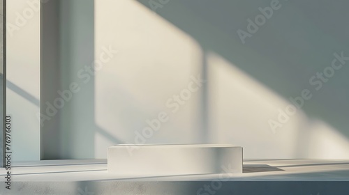 Elegant marble podium with sunlight and shadow on white wall background for product presentation