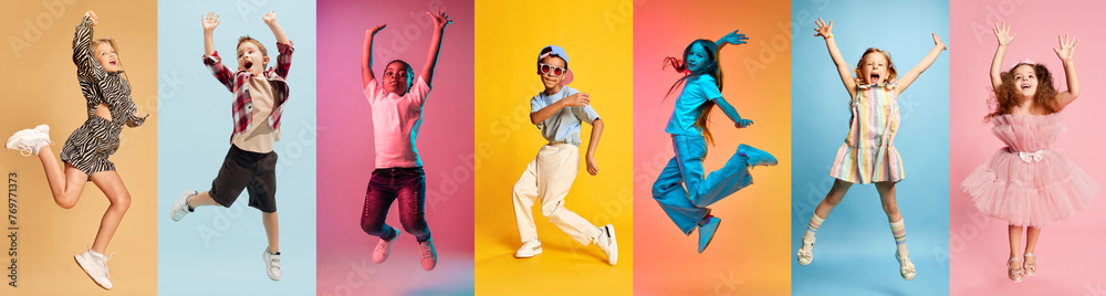 Energetic collage made of dynamic photos of happy, smiling children dancing in motion against multicolored studio background. Concept of human emotions, childhood, fashion and style, beauty, education