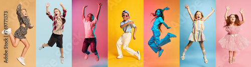 Energetic collage made of dynamic photos of happy, smiling children dancing in motion against multicolored studio background. Concept of human emotions, childhood, fashion and style, beauty, education
