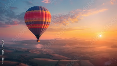 Hot Air Balloon at Sunrise Over Rolling Hills. Vibrant hot air balloon rises with the sun over picturesque rolling hills, casting a warm glow on the tranquil scene.