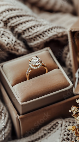 Diamond ring in a opened box. Wedding ring in case on light background, close up