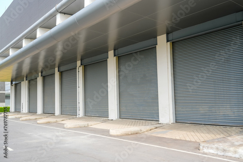 Steel metal doors, roller shutter door in warehouse building