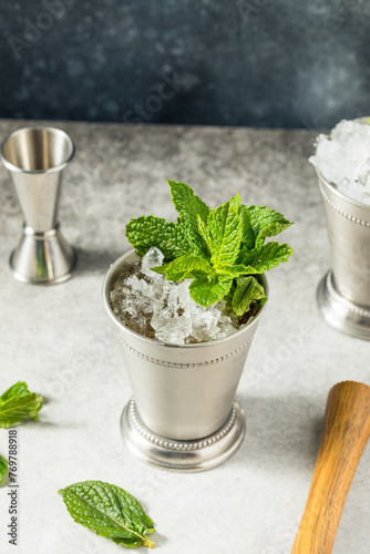 Refreshing Cold Iced Mint Julep Cocktail photo