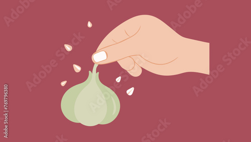  A persons hand crushing a fresh clove of garlic showcasing its pungent scent and its potential health benefits.