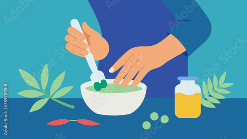  A womans hands expertly mixing together a paste of herbs and oils used for topical relief of aches and pains.