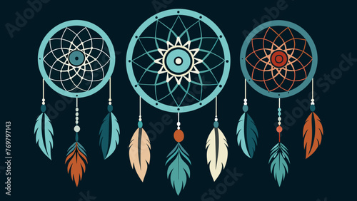  A set of intricately woven dreamcatchers adorned with beads and feathers used to bad dreams and protect dreamers during shamanic journeying.