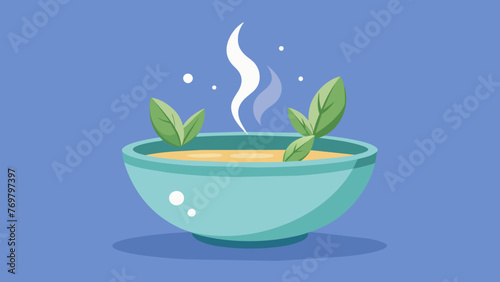  A bowl filled with steaming hot water and a few drops of eucalyptus oil creating a theutic and decongesting steam for respiratory health. photo