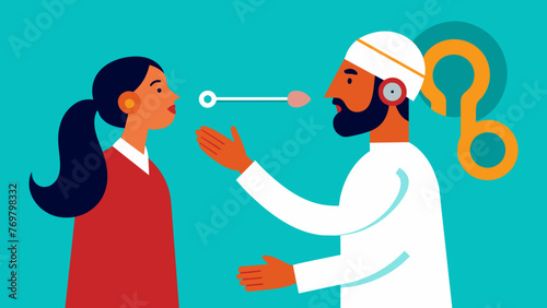  A traditional medicine practitioner holding a tuning fork to a patients ear using the vibrations and frequencies to aid in their healing