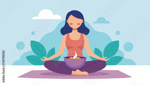  A woman sits crosslegged on a cushion her eyes closed in meditation as she plays a singing bowl. The bowl emits a deep calming sound that