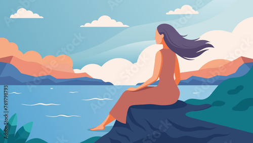 A woman sits atop a rocky cliff overlooking a vast ocean. The gentle breeze blows through her hair as she meditates her mind quiet and at