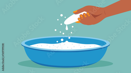  A hand sprinkling co sea salt into the bath providing not only exfoliation but also a generous amount of minerals and nutrients. The crystals