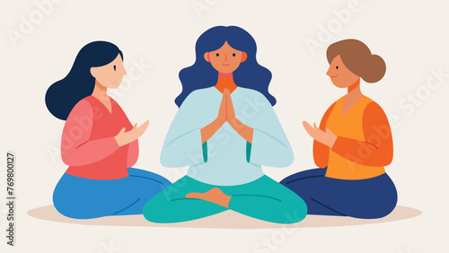  Two women sit facing each other their hands intertwined as a healer leads them in a prayerful meditation. The patients face is serene while the