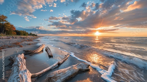 Sunset Rays over Driftwood-Lined Sandy Beach