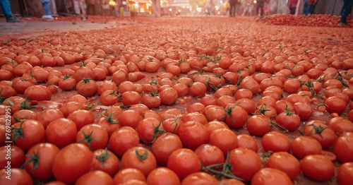 Tomato festival in Spain Tomatino. Tomatoes lie on the city streets photo