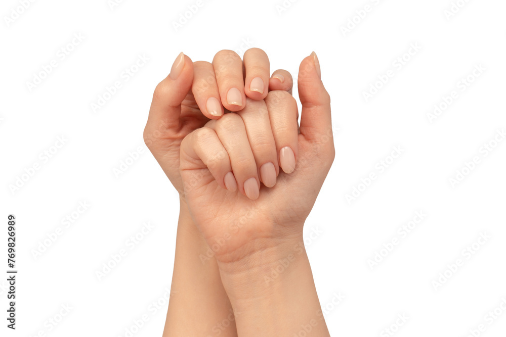 Woman hands isolated on a white background. Nude nail polish. Woman hands isolated on a white background. Nude nail polish.
