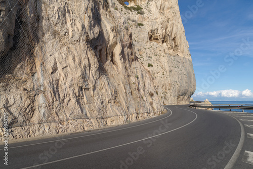 Coastal road winding along a cliff