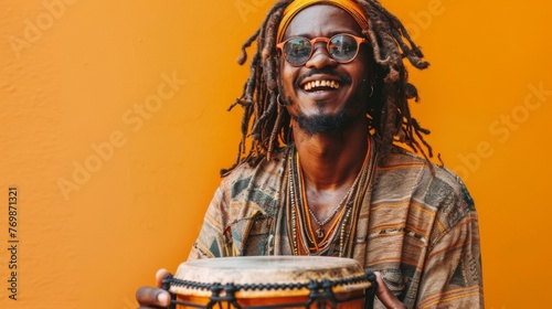 Man With Dreadlocks Holding Drum