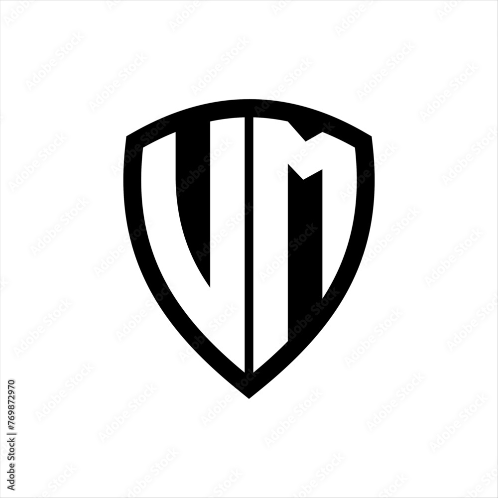 UM monogram logo with bold letters shield shape with black and white color design UM monogram logo with bold letters shield shape with black and white color design