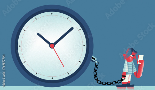Annoyed teenager using smartphone chained to clock photo