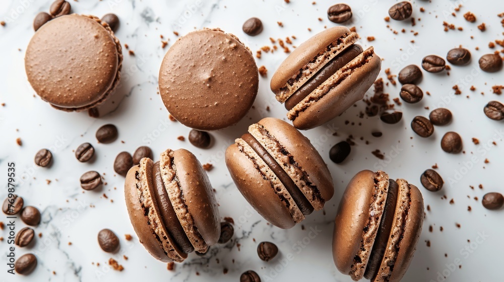 Top view of delicious coffee flavored macaroons with whole coffee beans